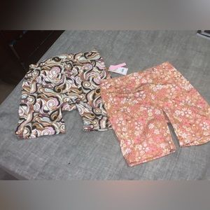 Never worn cute floral spandex biker shorts. Each are a size L.